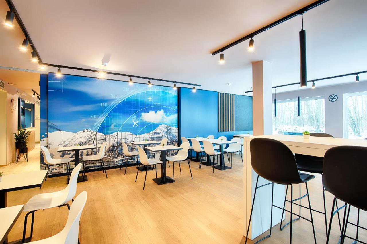 慕尼黑机场住宿加早餐酒店 哈尔伯格摩斯 外观 照片